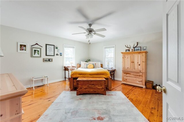 bedroom featuring ceiling fan and light hardwood / wood-style floors