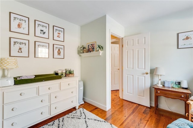 bedroom featuring light hardwood / wood-style floors