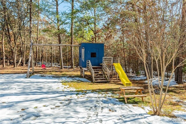 view of snow covered playground