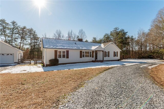 single story home with a garage