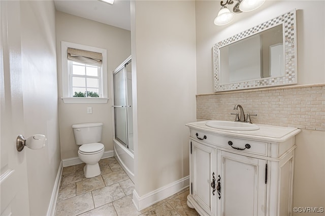 full bathroom with toilet, decorative backsplash, vanity, and enclosed tub / shower combo