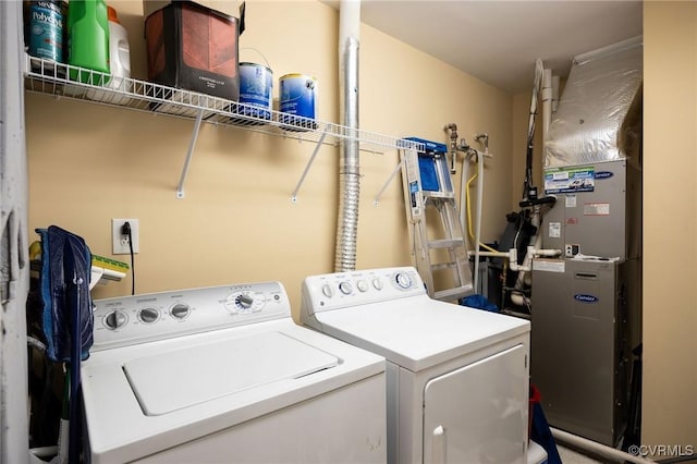 laundry room featuring washing machine and dryer