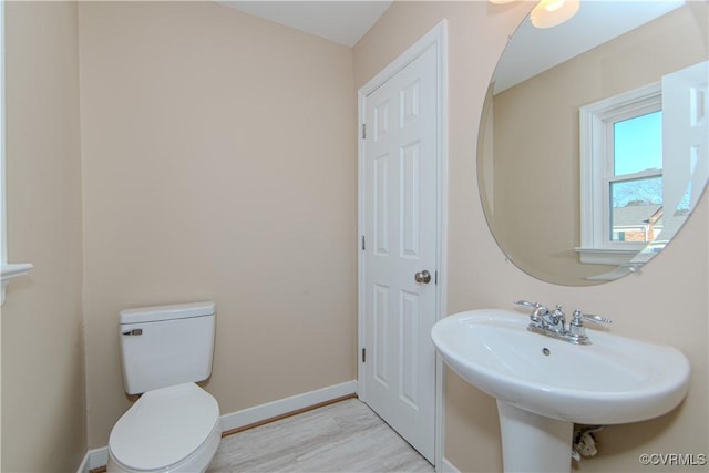 bathroom featuring toilet