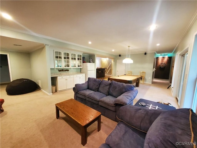 carpeted living room featuring billiards, crown molding, and indoor bar