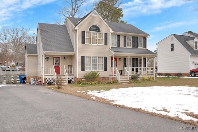 colonial inspired home featuring a porch