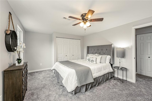 bedroom featuring ceiling fan, a closet, and light carpet