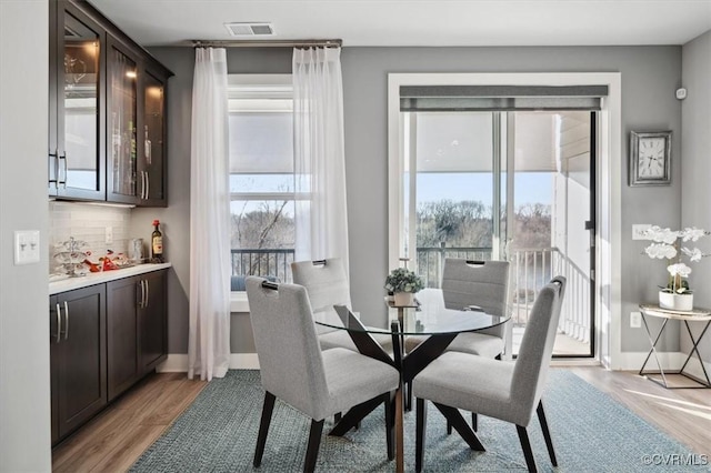 dining room with light wood-type flooring