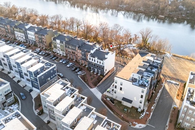 drone / aerial view with a water view