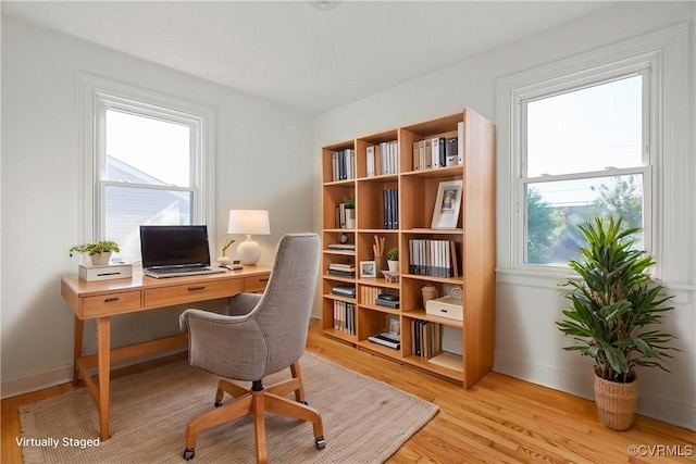 home office featuring light hardwood / wood-style flooring