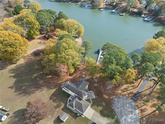 birds eye view of property featuring a water view