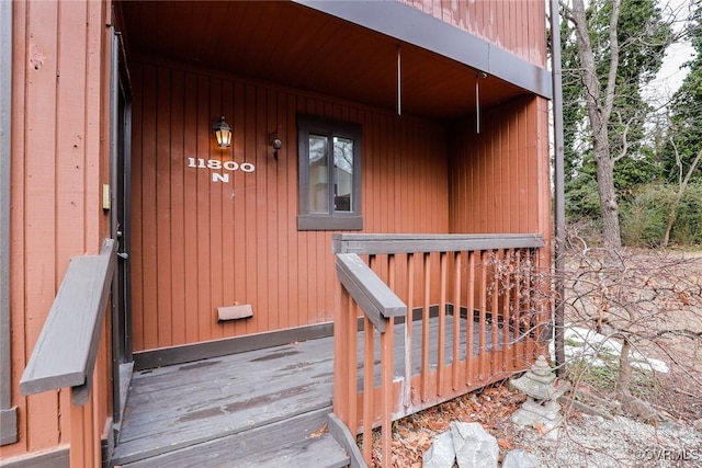 doorway to property with a deck