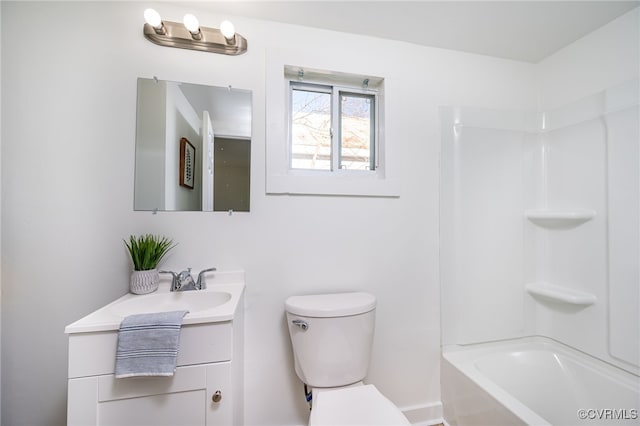 full bathroom featuring tub / shower combination, toilet, and vanity