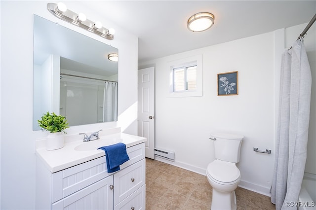 bathroom featuring a baseboard heating unit, vanity, and toilet