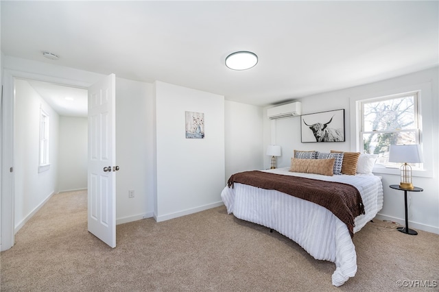 carpeted bedroom with an AC wall unit