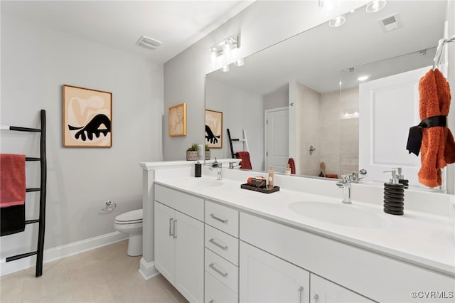 bathroom featuring a tile shower, toilet, tile patterned flooring, and vanity