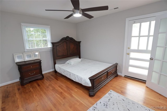 bedroom featuring ceiling fan and light wood-type flooring