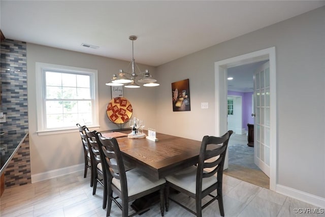 dining room featuring an inviting chandelier