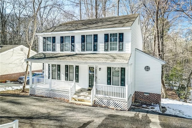 view of property featuring a porch