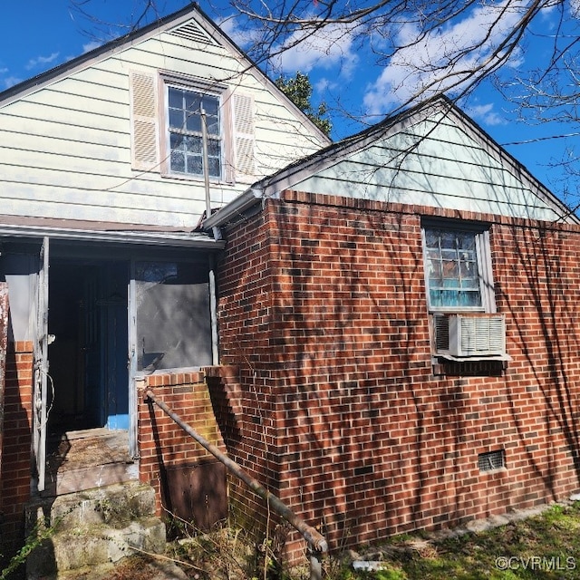 view of home's exterior featuring cooling unit