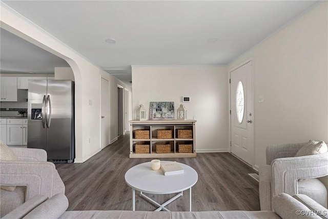 living room with dark hardwood / wood-style flooring