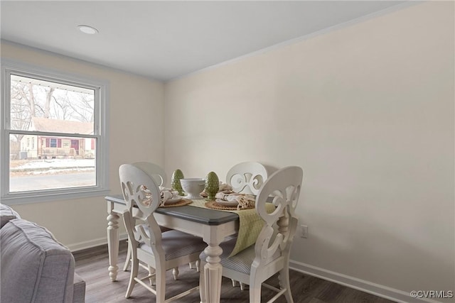 dining area featuring wood-type flooring