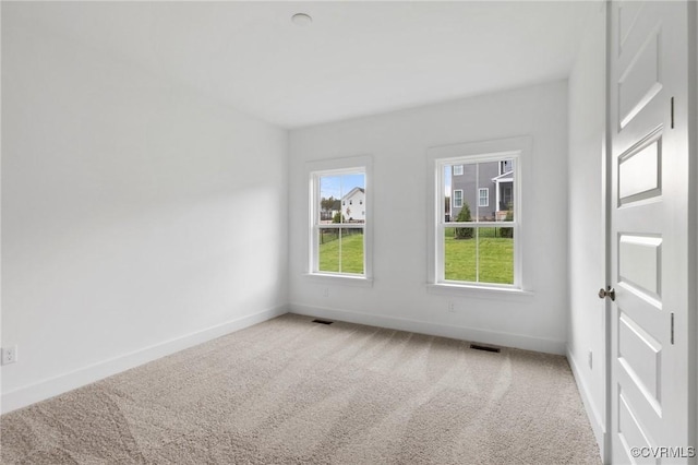 view of carpeted spare room