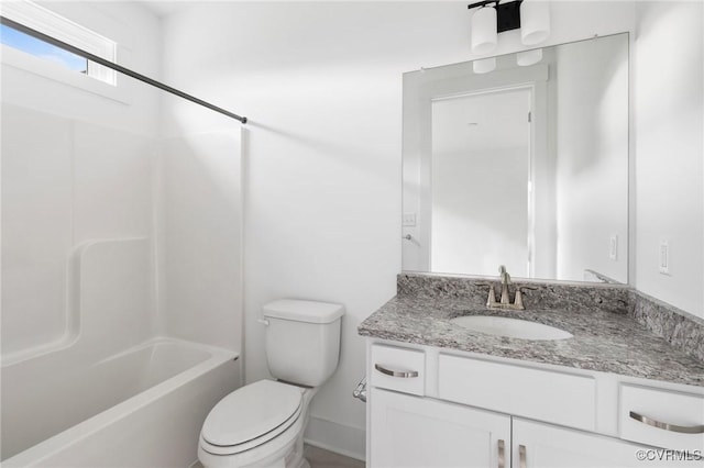 full bathroom featuring bathtub / shower combination, toilet, and vanity