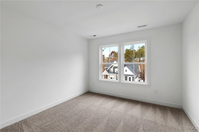 view of carpeted spare room