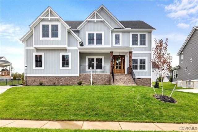 view of front of house featuring a front lawn and a porch