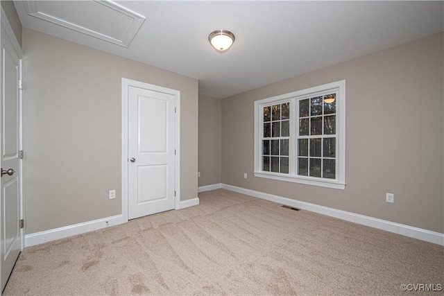 view of carpeted spare room