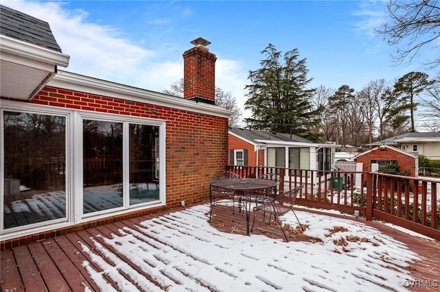 view of snow covered deck