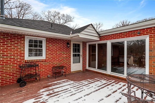 view of snow covered deck