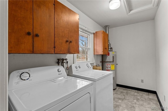 laundry room with cabinets, independent washer and dryer, and water heater