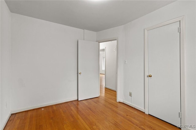 unfurnished bedroom featuring light hardwood / wood-style flooring