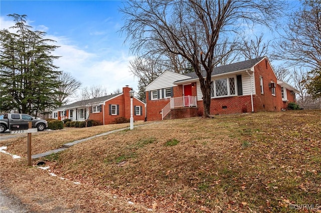 single story home featuring a front yard