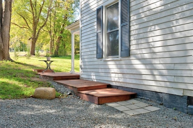 view of property exterior featuring a lawn