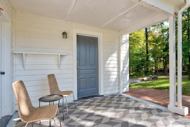 doorway to property featuring a patio