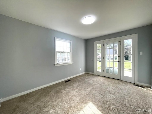 view of carpeted spare room