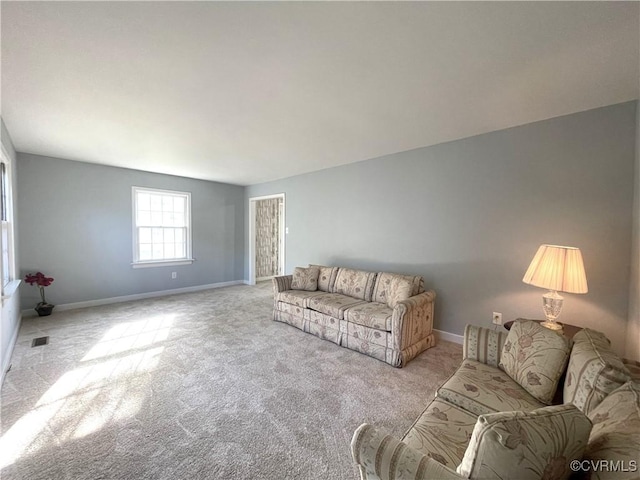 living room with light colored carpet