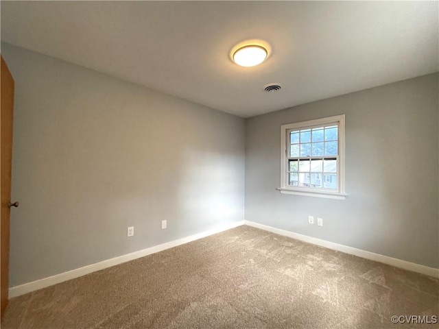 view of carpeted spare room