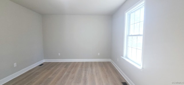 empty room featuring light hardwood / wood-style floors