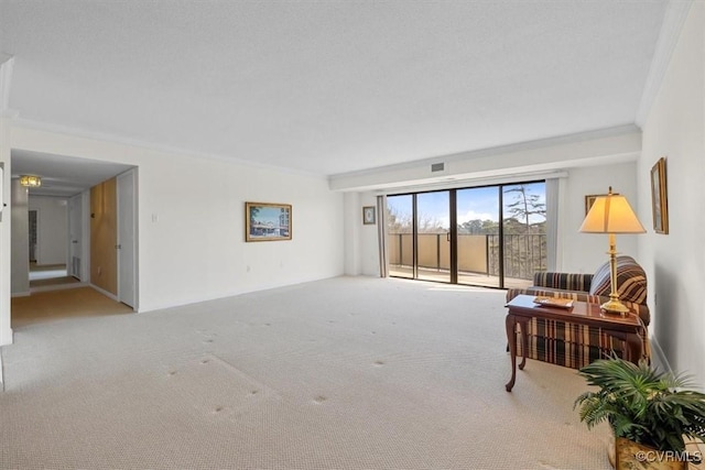 living room featuring light carpet and ornamental molding