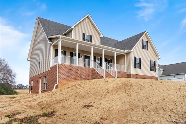 view of front of home featuring covered porch