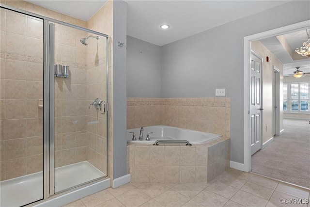 bathroom with ceiling fan, tile patterned floors, and shower with separate bathtub