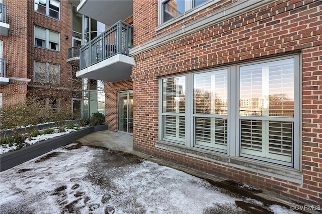 view of snow covered patio