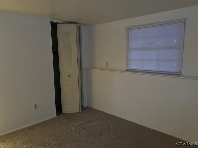 unfurnished bedroom with carpet flooring