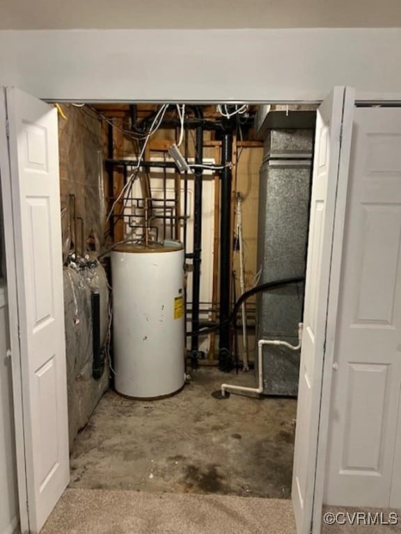 utility room with water heater