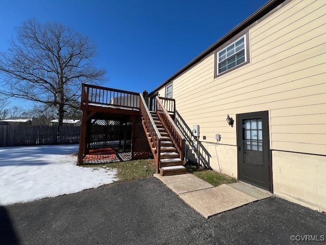 exterior space with a patio area and a wooden deck