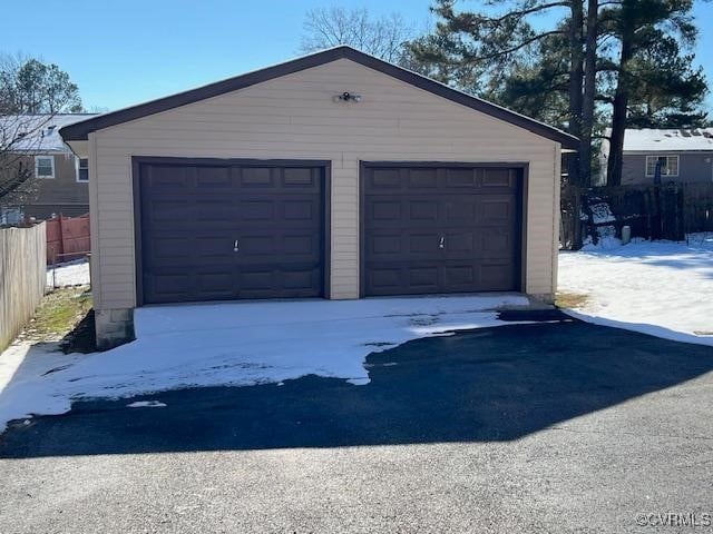 view of snow covered garage