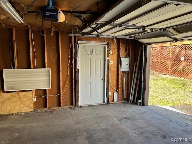 garage featuring a garage door opener